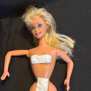 Blonde Barbie Doll with Blue Eyes